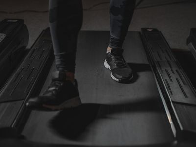 Close up of sports shoes stepping on a treadmill